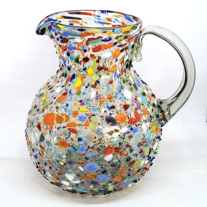 Wholesale MEXICAN GLASSWARE / Confetti Rocks 120 oz Large Bola Pitcher / Confetti rocks appear to rest inside this modern blown glass pitcher that will make your table setting shine. Each pitcher is adorned with hundreds of tiny multicolor glass particles, giving it a one-of-a-kind look and feel.